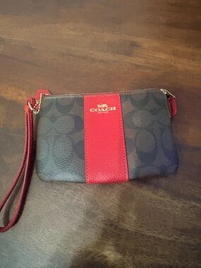 Coach Brown Signature Wristlet with Red Center Stripe